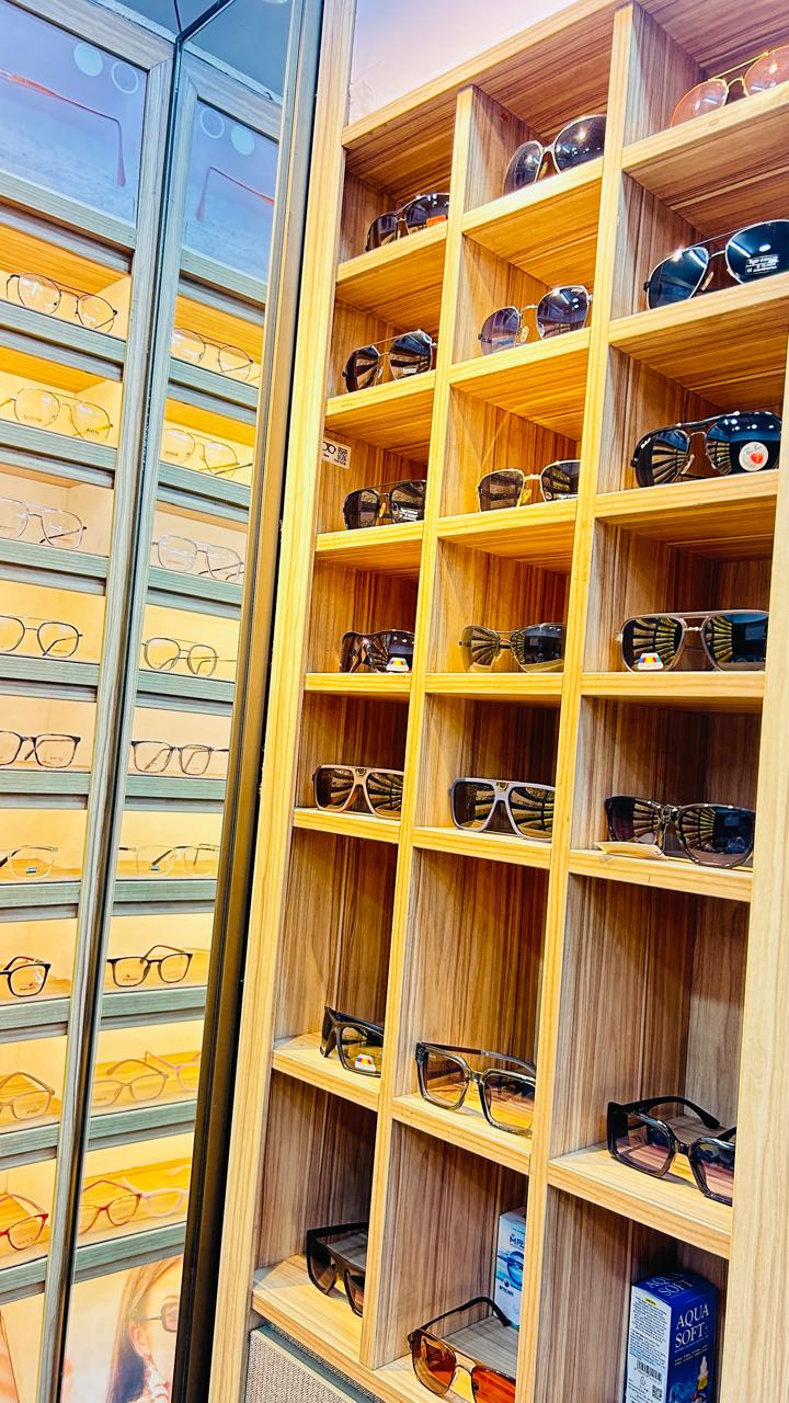 Premium sunglasses wall — Eye Vision Opticians Hyderabad